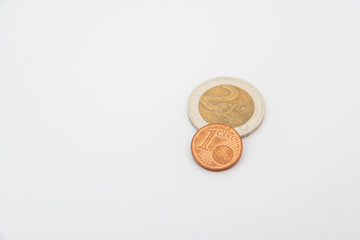 Euro coins lying on a white background