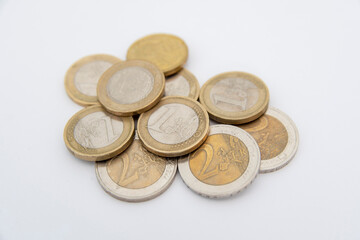 Euro coins lying on a white background