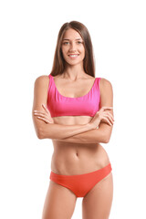 Fototapeta premium Young tanned woman in swimsuit on white background