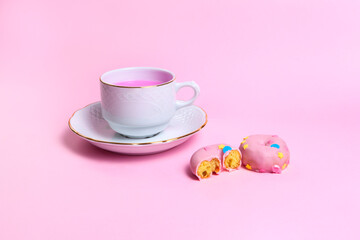 Fototapeta na wymiar pink breakfast with pink sweets on pink background