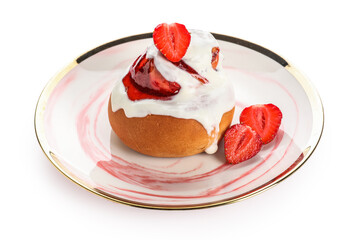 Plate of strawberry cinnamon roll with cream on white background
