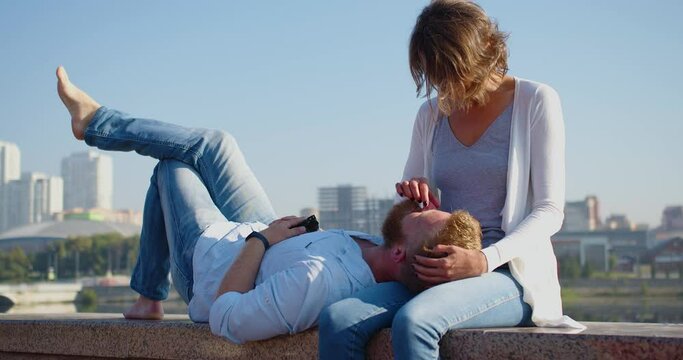 Middle aged couple enjoy each other outdoor. Love and relationships concept.