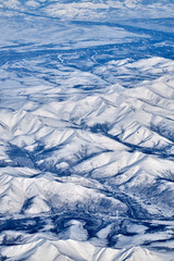 Mountain landscape, view from an airplane, Snowy panorama