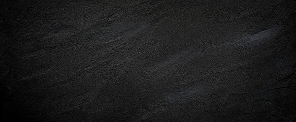 Black or dark gray rough grainy stone or sand texture background - obrazy, fototapety, plakaty