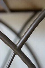 Fototapeta na wymiar Abstract light and shadow of steel table leg.