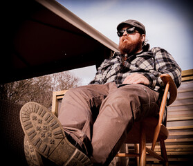 Obraz premium person sitting on a chair