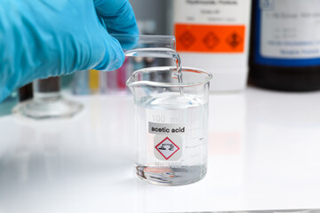 Acetic acid in glass, chemical in the laboratory