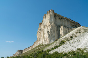 white chalk limestone rock against a blue sky aerial view