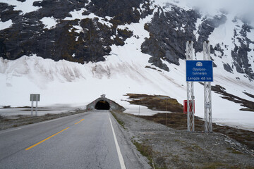 tunnel entrance on a snowy mountain in norway