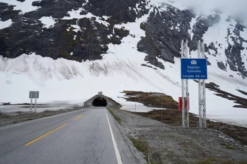 Dekokissen tunnel entrance on a snowy mountain in norway © Fizzl