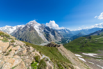 Summer trekking day in the mountains of Val Veny, Courmayeur