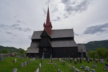 Fototapeta na wymiar Ringebu stave church and cemetery