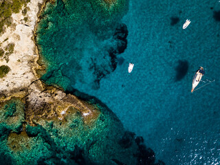 Italy, July 2022. Aerial view of the Quakes islands with their Caribbean sea