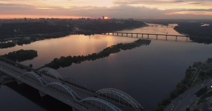 Sunset aerial view on a Darnitsky Bridge in Kyiv,Ukraine