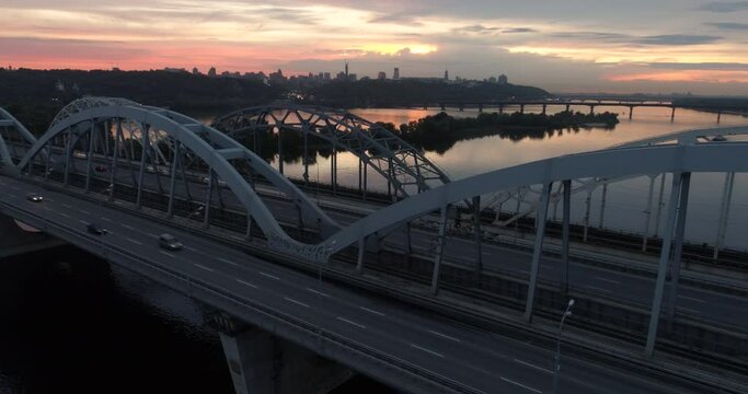 Sunset aerial view on a Darnitsky Bridge in Kyiv,Ukraine
