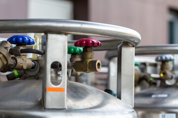 Valves of nitrogen, Helium, Oxygen tank and Gas Pressure Meter with Regulator. Gas tank.
