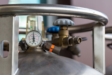 Valves of nitrogen, Helium, Oxygen tank and Gas Pressure Meter with Regulator. Gas tank.