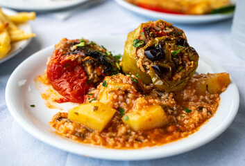 Rise stuffed fresh tomato and pepper in greek tavern