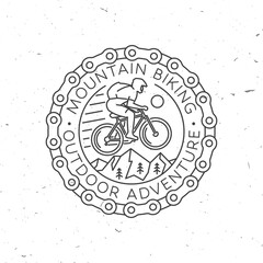 Fototapeta premium Mountain biking. Vector illustration. Concept for shirt or logo, print, stamp or tee. Vintage line art design with man riding bike, chain and mountain silhouette. Outdoor adventure.