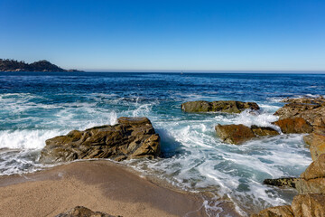 A view on the ocean with the rocks and waves