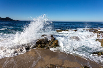 A view on the ocean with the rocks and waves