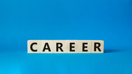 Career symbol. Concept word Career on wooden cubes. Beautiful blue background. Business and Career concept. Copy space.