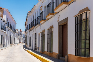 Street with old houses in the town of Valencia del Ventoso, Badajoz.