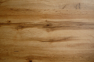 Fototapeta premium Wooden background texture. Light brown surface of old knotty wood with a natural color