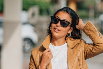 portrait of latina hispanic american girl with sunglasses