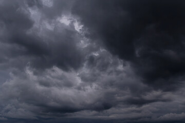 Epic Dramatic Storm sky with dark grey cumulus rainy clouds background texture, thunderstorm