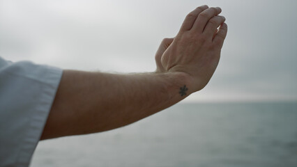 Unknown sportsman hands practicing karate position. Strong man training strength © stockbusters