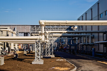 Construction site of the factory or power plant - obrazy, fototapety, plakaty
