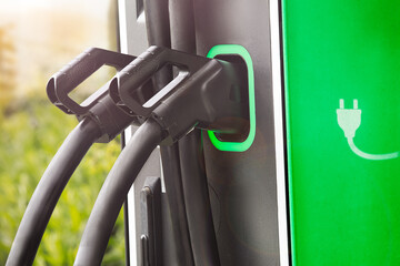 plus häng in station ready to fuel electric car with power instead of gasoline or petrol is the...