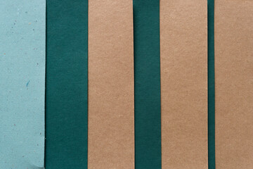 Fototapeta premium background with paper - brown and green paper stripes