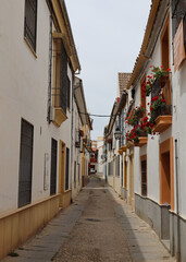 Fototapeta na wymiar One of the narrow streets in Cordoba