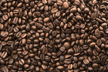 Coffee Beans in White Heart Shape Plate on Fresh Coffee Beans Background.