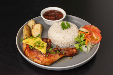 Typical Costa rican casado with rice and beans, salad, meat