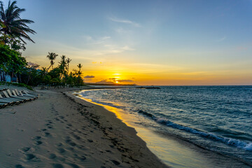 Sunset at Playa dorada in Puerto Plata - Dominican Republic, Beautiful Tropical Beach - July 2, 2022. - obrazy, fototapety, plakaty