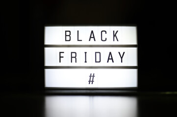 black friday light box in black background holiday shopping concept