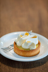 Lemon meringue tart in cafe