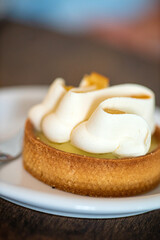 Lemon meringue tart in cafe
