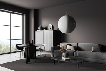 Grey meeting room interior with eating table and couch, panoramic window