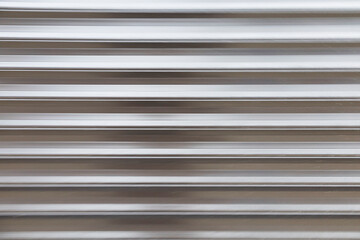 abstract background of horizontal stripes of metallic color