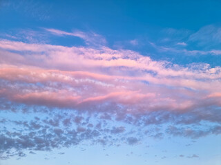 Spectacular blue and purple sky with cumulus clouds.
Evening photography. Full frame, Heaven concept. Atmosphere air freedom.
