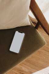 Flatlay phone on vintage chair. Aesthetic elegant blog, online shop, store social media template