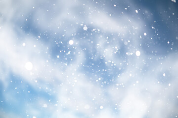 blue snowfall bokeh background, abstract snowflake background on blurred abstract blue