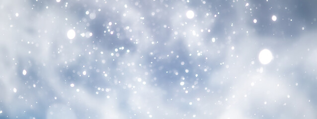 blue snowfall bokeh background, abstract snowflake background on blurred abstract blue