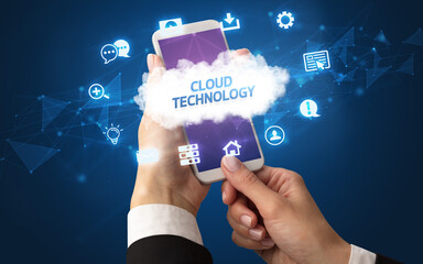 Hand using smartphone with cloud technology concept