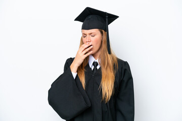Young university graduate caucasian woman isolated on white background yawning and covering wide open mouth with hand
