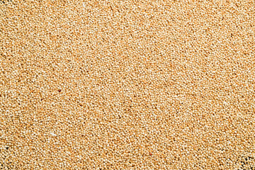 White quinoa macro photo. Healthy organic food. On a stone background. Top view.